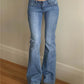 90s blue low waist flared trousers with washed effect