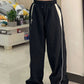 Black baggy oldschool sweatpants with contrast piping