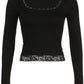Black long sleeve crop top with square neckline and lace trim