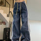 Faded boyfriend jeans with splice piping and drawstring