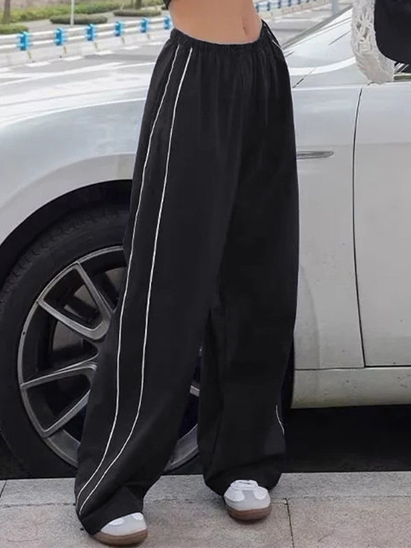 Schwarze Baggy Sweatpants mit Paspeldetail