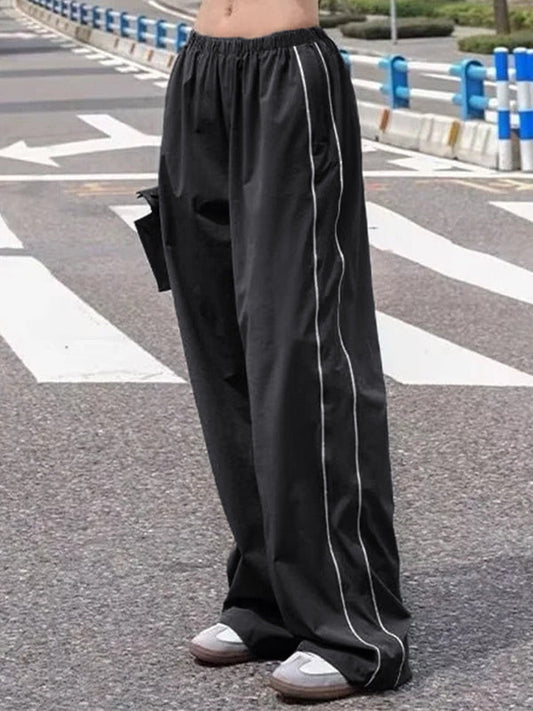 Schwarze Baggy Sweatpants mit Paspeldetail