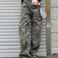Green camouflage cargo jeans with a wash effect