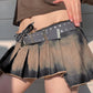 Irregularly pleated mini denim skirt