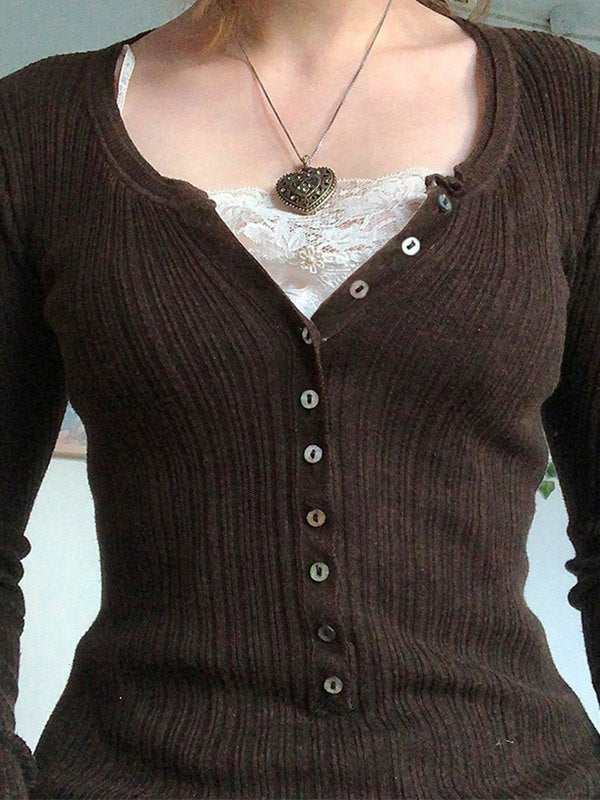 Long-sleeved knitted top with lace pattern and buttons